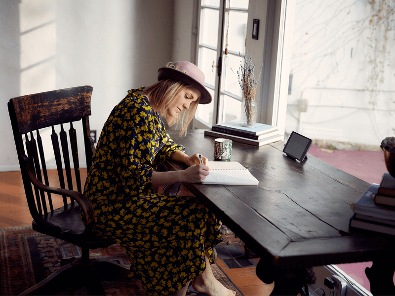 Author Writing at Desk